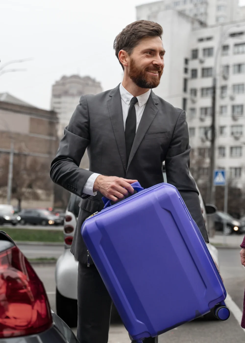 Professional Chauffeur greeting executive client in Ronkonkoma